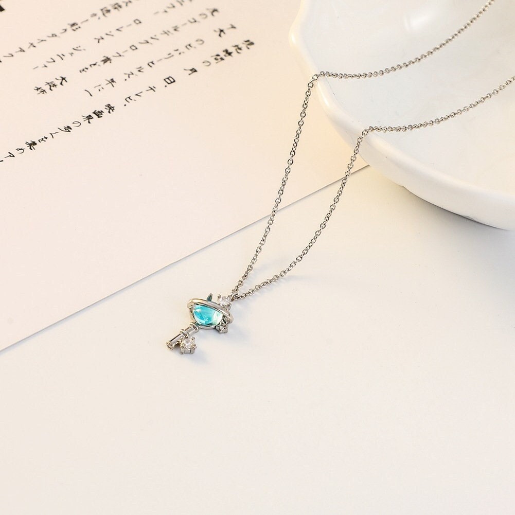Blue Crystal Planet Key Necklace