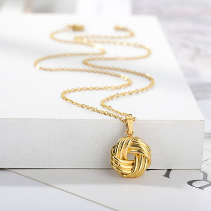 Silver And Gold Knot Pendant Necklace